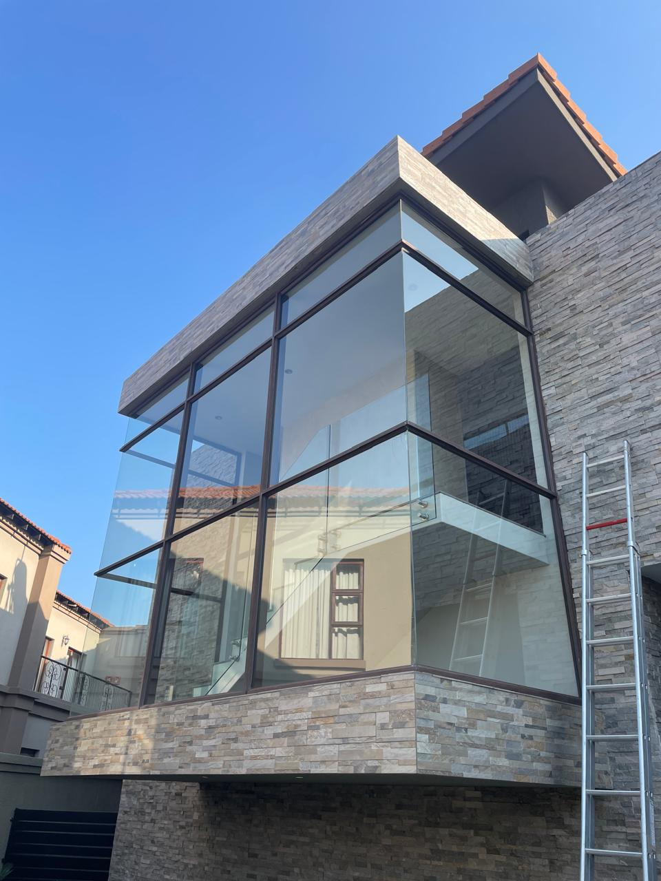 Gable Glazing at Sunset aluminium and glass installation