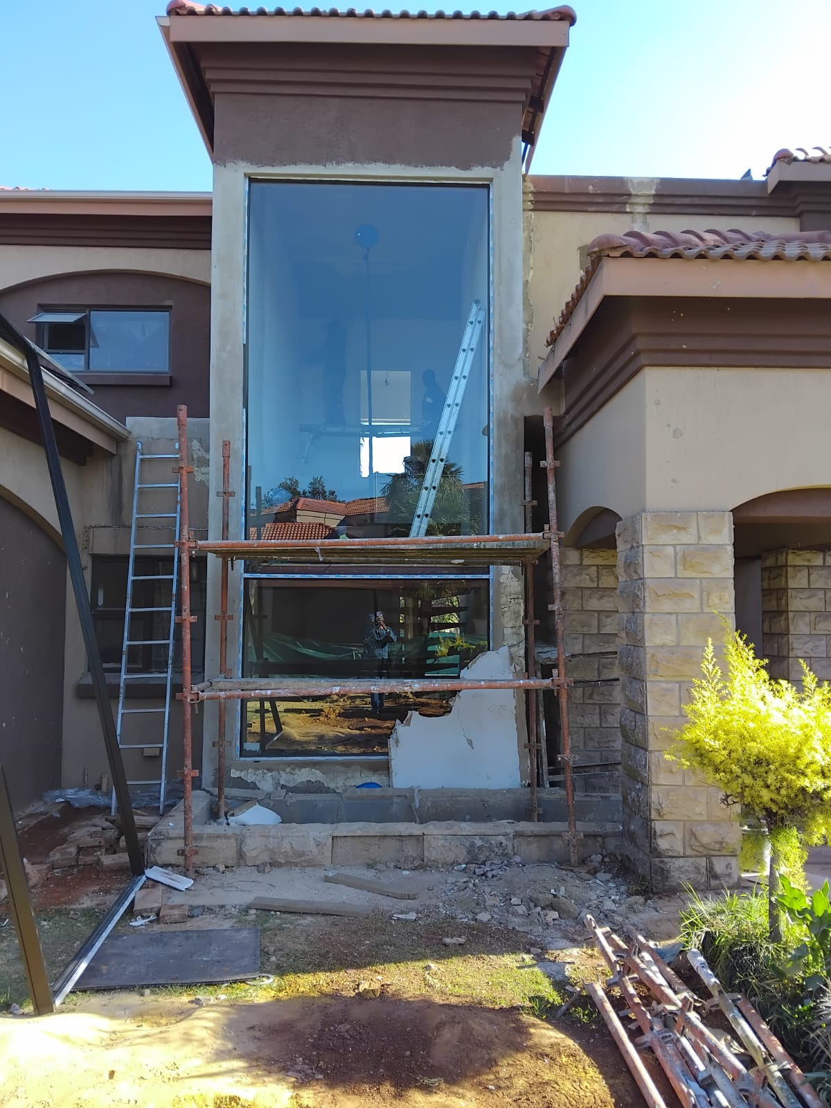 Double-Volume Gable Glazing aluminium and glass installation